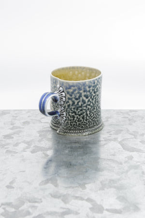 Special stoneware mug with flower detail