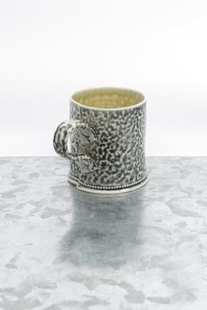Stoneware mug with flower detail
